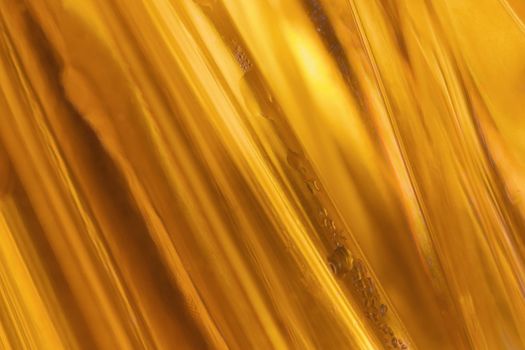 close-up shot of abstract golden glass bachground