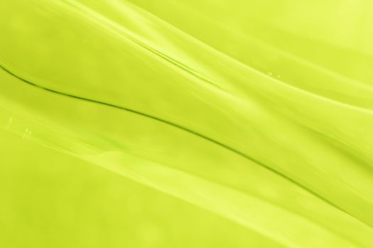 close-up shot of abstract green glass background