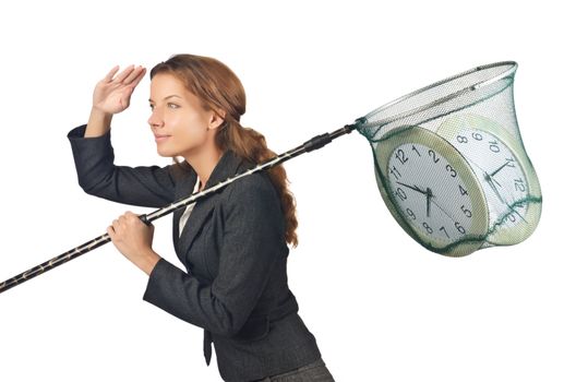 Businesswoman with net and clocks