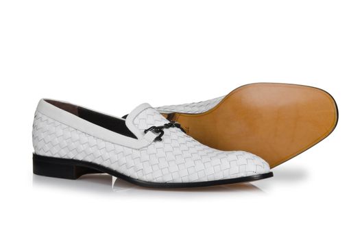 Fashion concept with male shoes on white