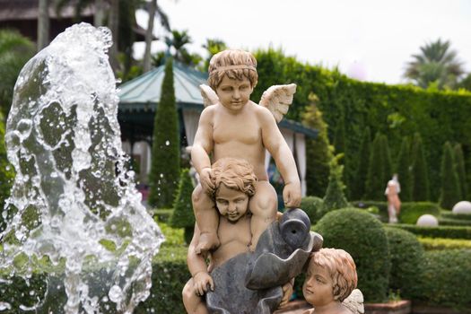 molded Cupid fountain figure