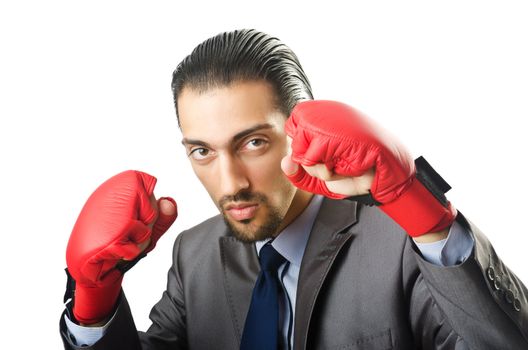 Businessman with boxing gloves on white