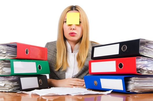 Busy woman with stacks of paper