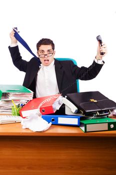 Busy stressed man in the office