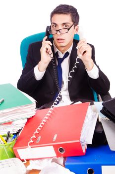 Busy stressed man in the office