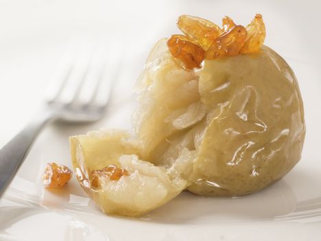 close up of a golden baked apple