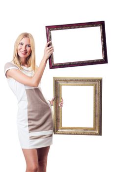 Woman with picture frame on white