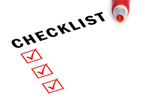 Checklist with red felt marker and checked boxes. 