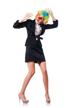 Businesswoman in clown costume on white