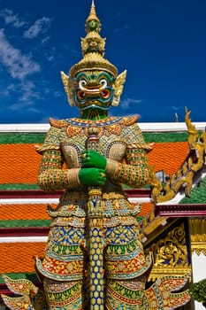 molded demon figure that the Temple of the Emerald Buddha