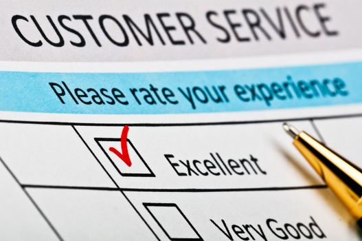 Customer service satisfaction survey form with red tick placed in excellent checkbox.