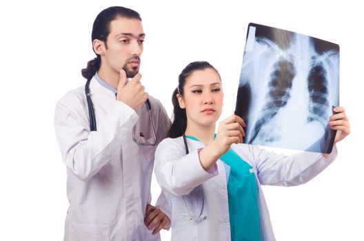 Two doctors looking at x-ray image on white