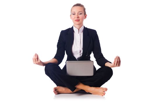 Businesswoman meditating isolated on white