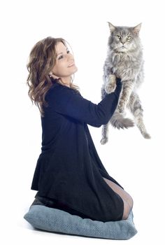 portrait of a purebred  maine coon cat and woman on a white background