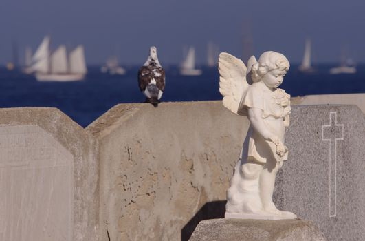 angel statue in Saint Tropez, sea coast