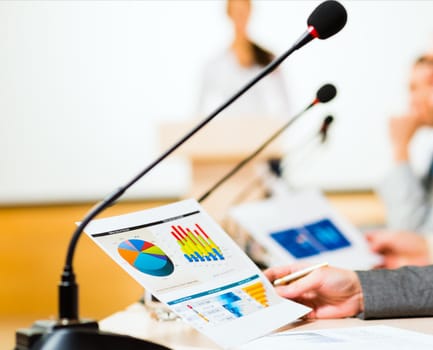 close-up microphone, on the background of business communication at the conference