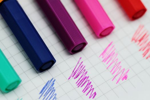 Color pens isolated on graduated background