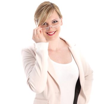High key fresh upper body portrait of a smiling charming business executive peering over the top of her glasses at the camera isolated on white