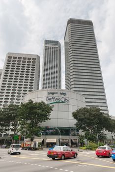 SINGAPORE - SEP 8: Raffles City on Sep 8, 2012  in Singapore. It is complex of hotels and an office tower over a podium which contains a shopping mall and a convention centre