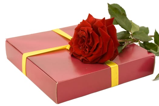 Gift and red roses isolated on white background
