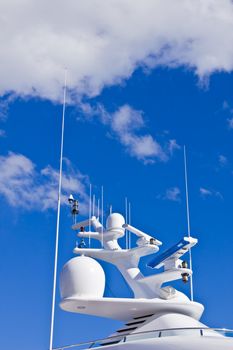Navigation equipment of a big white motor yacht.