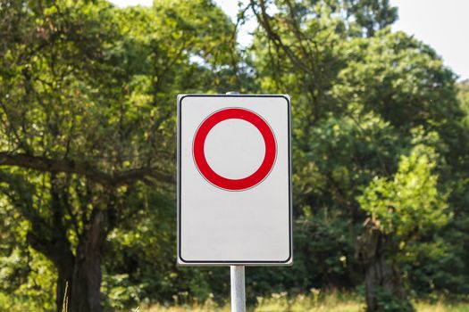 Road regulatory sign protecting the woods