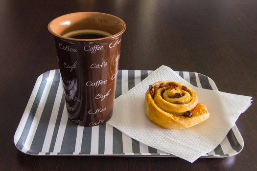 Tray for the morning meal on wooden table