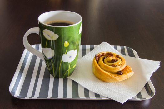 Tray for the morning meal on wooden table