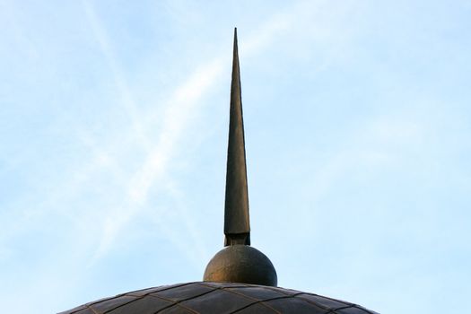 spire aimed at blue sky