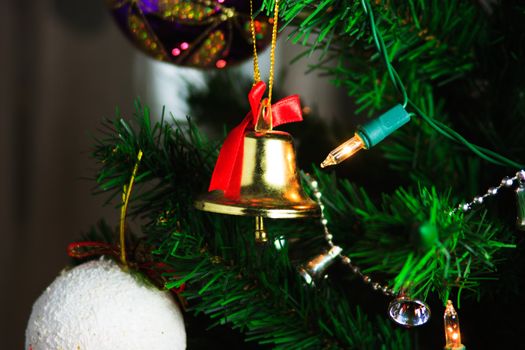 christmas bell hanging on the christmas tree