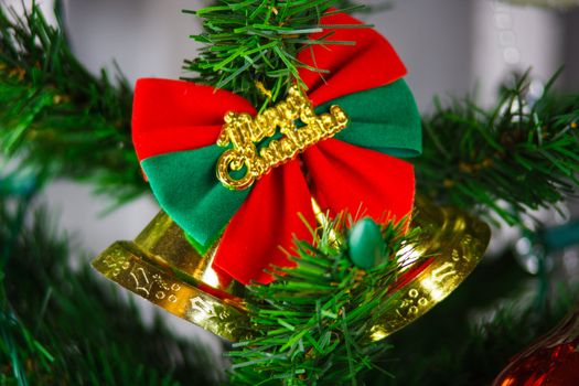 christmas bell hanging on the christmas tree