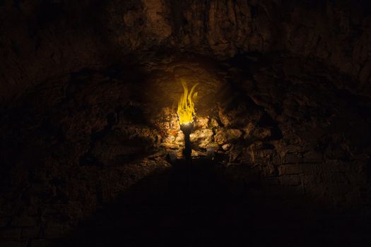 torch on the wall of an old castle. Dubno, Ukraine