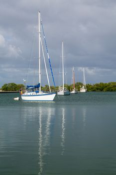Yachts and boats moored in No Name Harbor in Bill Baggs Cape Florida State park Key Biscayne Miami