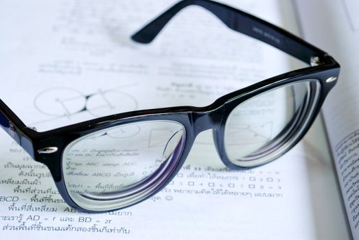 Open book and glasses