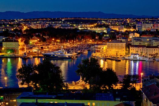 Zadar luxury yacht marina night view, with cityscape, Dalamtia, Croatia