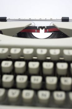 a close up of typewriter, focus on paper page.