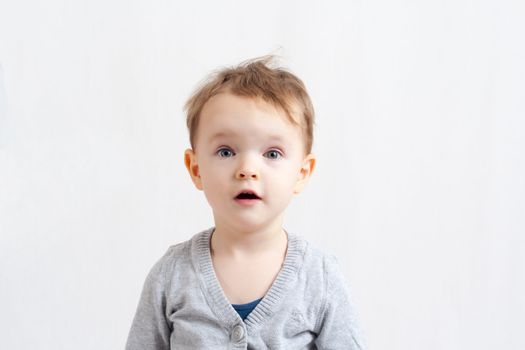 Little Girl looking surprised with open mouth