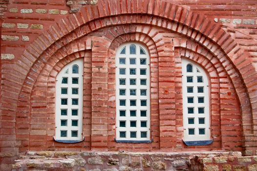 Window and aged brick wall