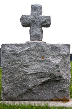 Gravestone made of granite in nice gray color on top is a cross