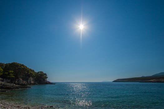 shining sun on the beach in blue