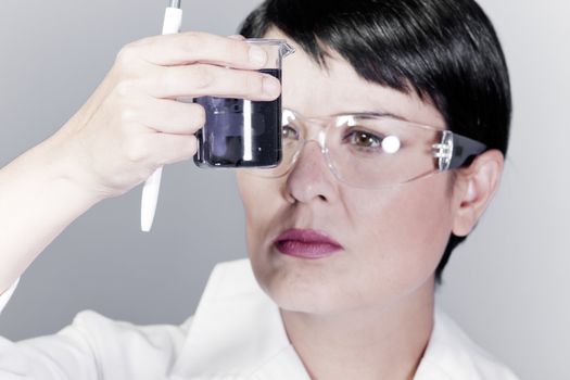 woman medical research chemist experiment