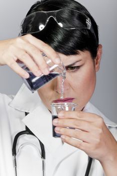 chemist working, focus on test tube