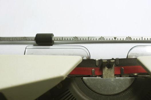 a close up of typewriter, focus on paper where message will be typed.