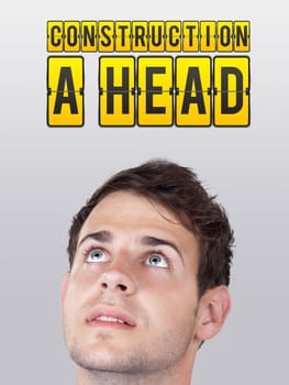 Young persons head looking with gesture at idea type of sign