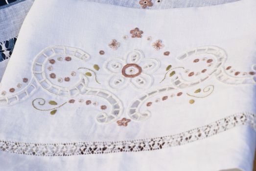 carved and embroidered cloth. handmade.