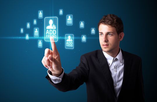 Businessman pressing modern social buttons on a virtual background