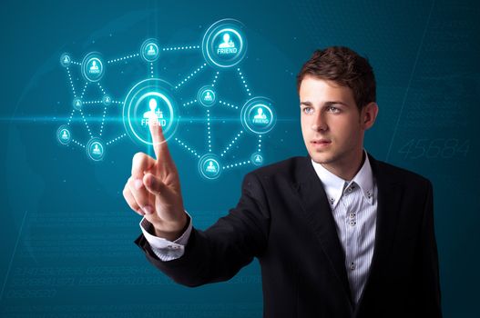 Businessman pressing modern social buttons on a virtual background