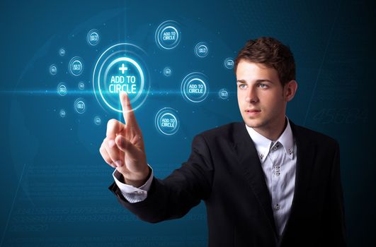 Businessman pressing modern social buttons on a virtual background