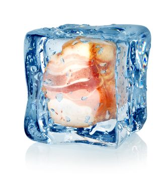 Ice cube and fat bacon isolated on a white background