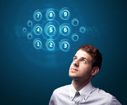 Businessman pressing high tech type of modern buttons on a virtual background